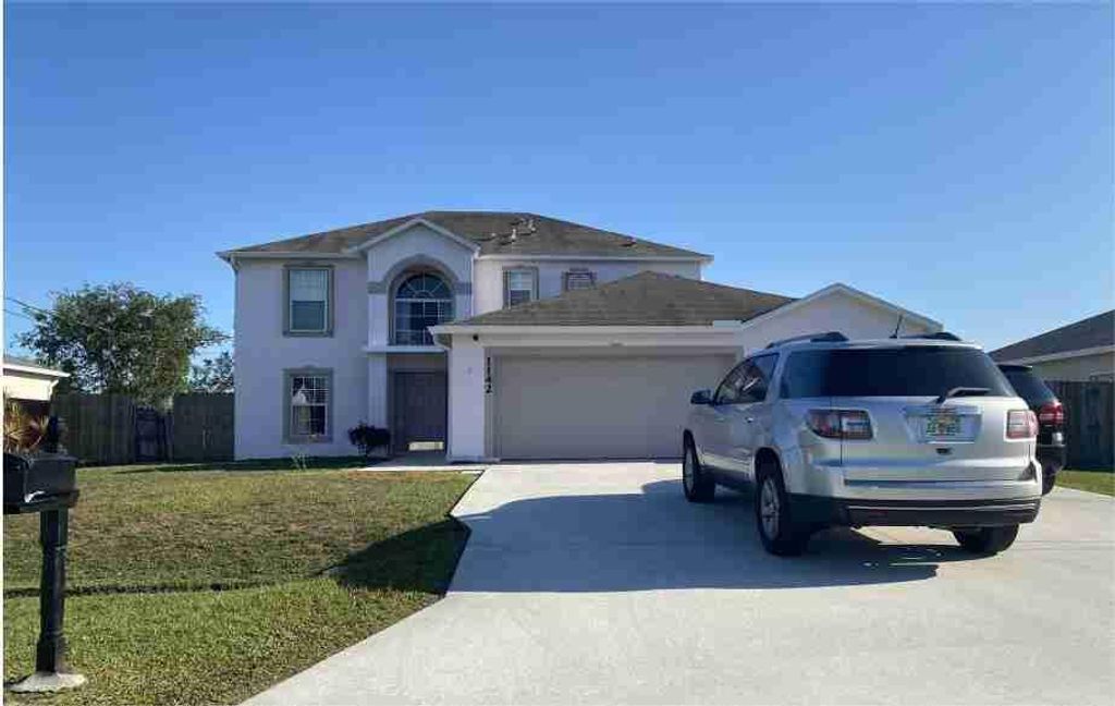 Photo of 1142 SW Sudder Avenue, Port Saint Lucie, FL 34953 (MLS # R10708383)