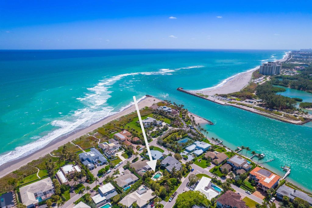 Photo of 73 Colony Road, Jupiter Inlet Colony, FL 33469 (MLS # R10968618)