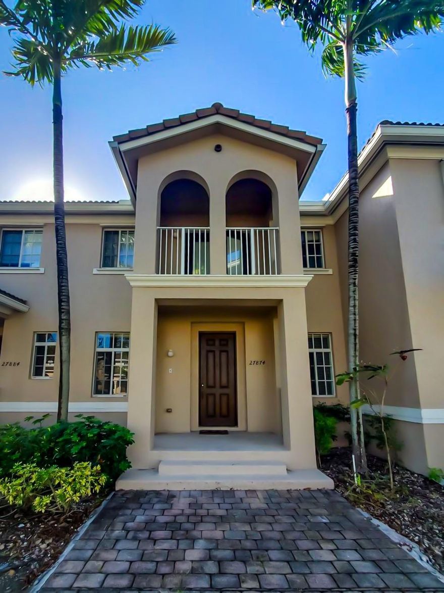 This spacious 2-bedroom, 2.5-bath townhome features a versatile bonus den that can easily serve as a third bedroom, home office, or creative space. Step inside to discover an open-concept layout with a stylish kitchen boasting granite countertops, stainless steel appliances, and a breakfast bar perfect for casual dining. Upstairs, the oversized primary suite offers a walk-in closet, dual sinks, and a private balcony your personal retreat. Highlights include in-unit laundry, a 1-car garage with two extra parking spaces, a new tankless water heater. New Carpet and vinyl floor. Enjoy resort-style amenities including a clubhouse, pool, gym, kids play area, and 24/7 security. HOA covers cable, internet and landscape. Located minutes from Turnpike, shopping, dining and school.