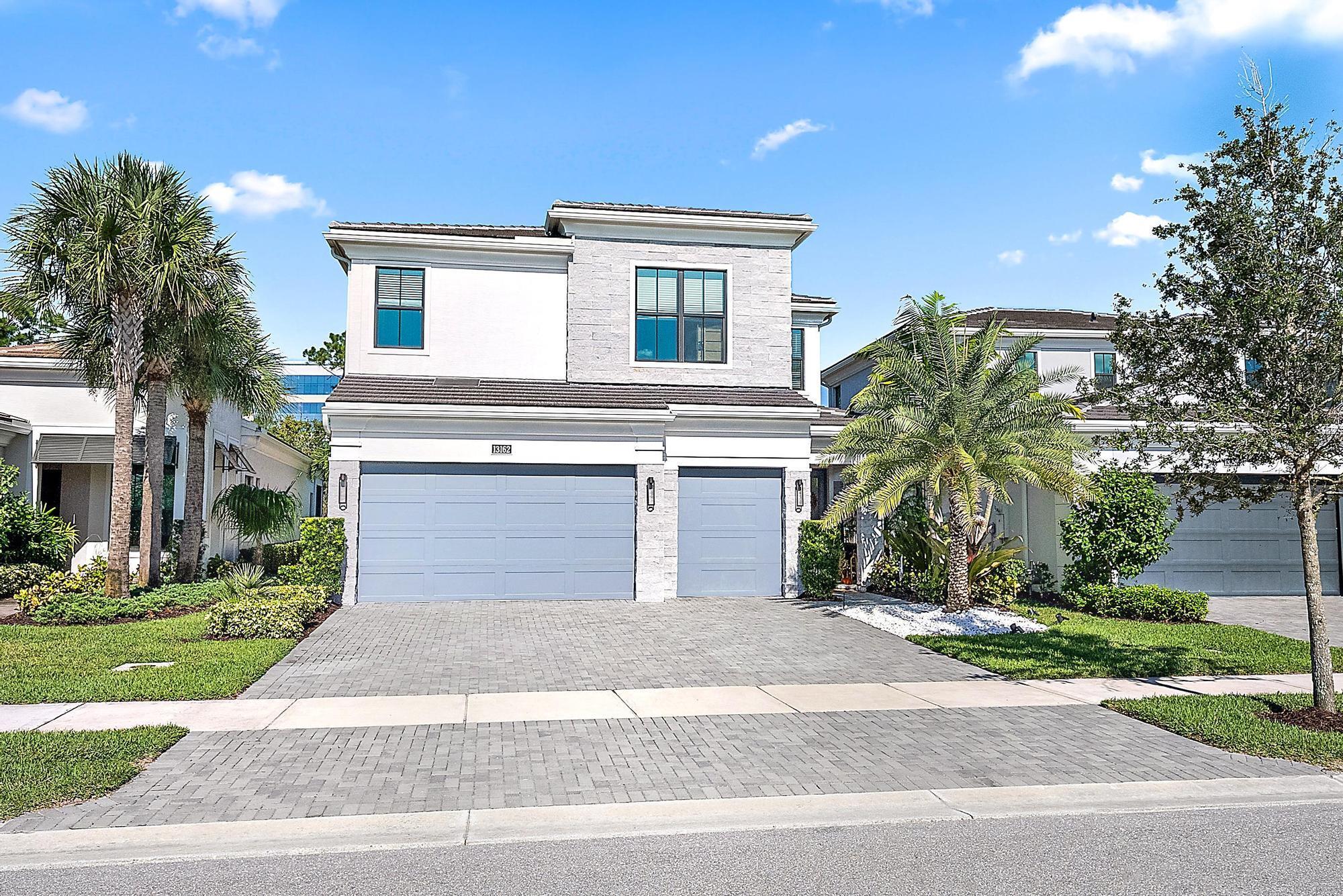 Built in 2023, this striking two-story home blends modern design with timeless elegance in the gated community of Artistry. Offering 4 bedrooms, a flexible den, loft, and 3.5 bathrooms across nearly 3,600 square feet, the layout is open, bright, and purposefully designed for both entertaining and everyday living. The kitchen is a statement piece with quartz surfaces, sleek cabinetry, built-in oven, a 36'' cooktop, and a designer vent hood. Oversized sliding doors open to a covered lanai and peaceful preserve backdrop--your own quiet retreat. Upstairs, the primary suite is a true sanctuary with volume ceilings, dual walk-in closets, and a spa-style bath. A 3-car garage, impact windows, and curated finishes add everyday function to luxury.
