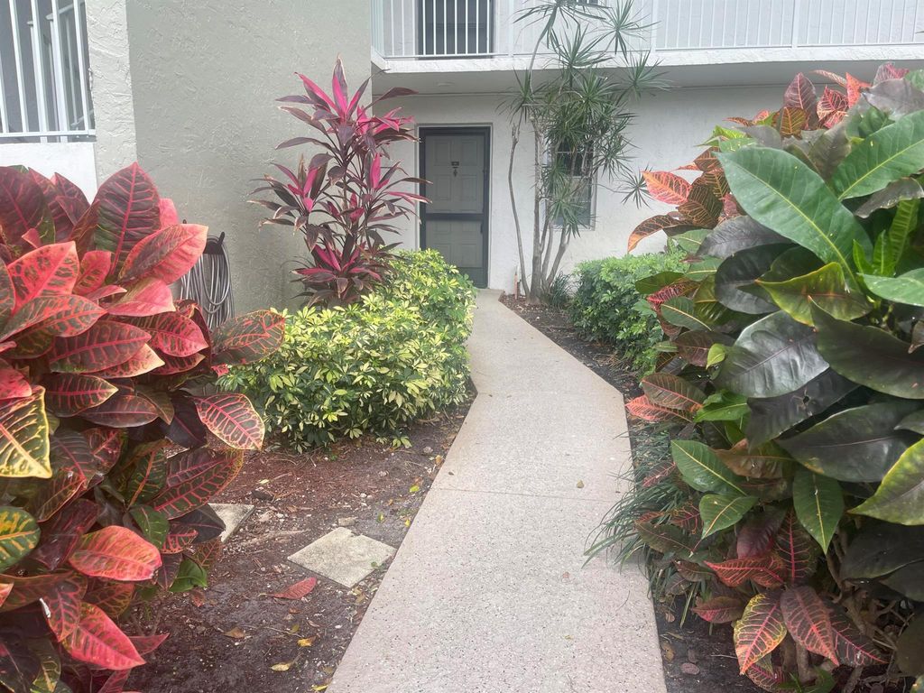 Photo of 2230 N Cypress Bend Drive #101, Pompano Beach, FL 33069 (MLS # R11087407)
