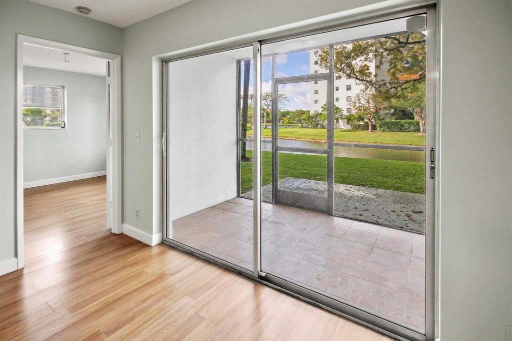Photo of 2230 N Cypress Bend Drive #101, Pompano Beach, FL 33069 (MLS # R11087407)