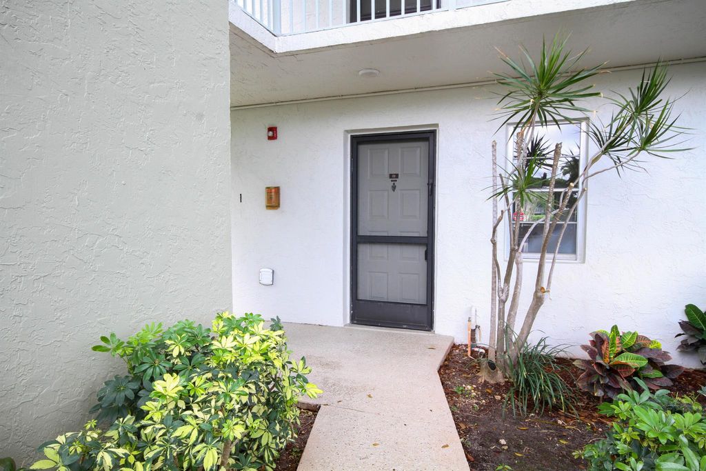 Photo of 2230 N Cypress Bend Drive #101, Pompano Beach, FL 33069 (MLS # R11087407)