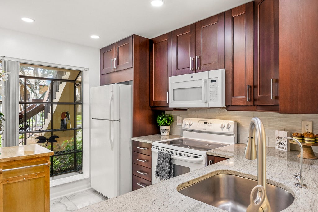 Photo of 2225 SW 15TH Street #223, Deerfield Beach, FL 33442 (MLS # B26093346)