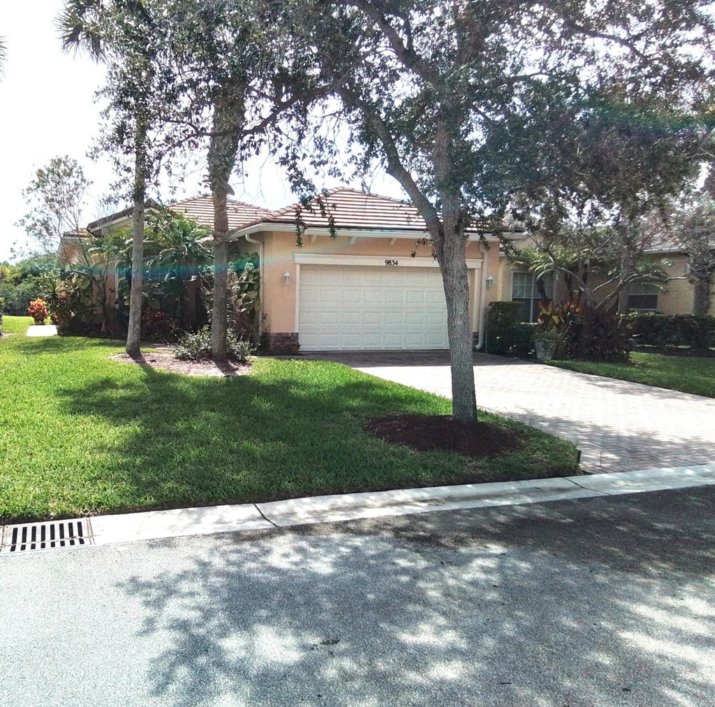 Photo of 9834 SW Eastbrook Circle, Port Saint Lucie, FL 34987 (MLS # R11009869)