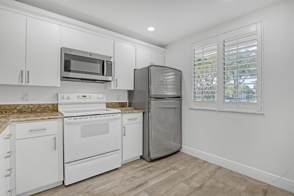 Photo of 6157 Balboa Circle #101, Boca Raton, FL 33433 (MLS # R11088847)