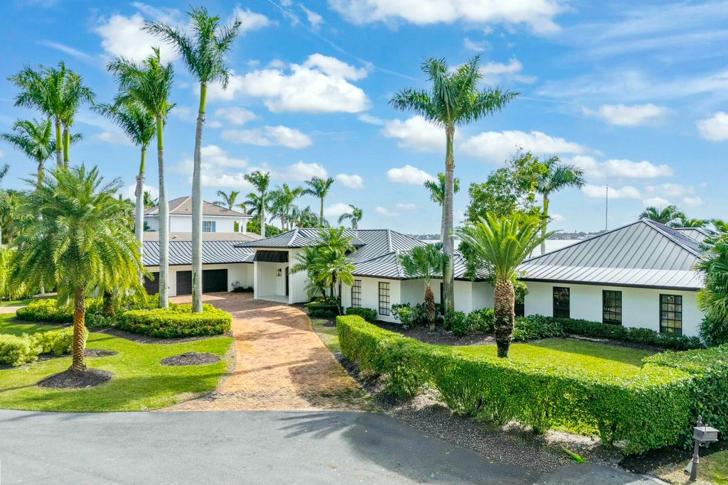 Photo of 10 Yacht Club Place, Tequesta, FL 33469 (MLS # R11045749)
