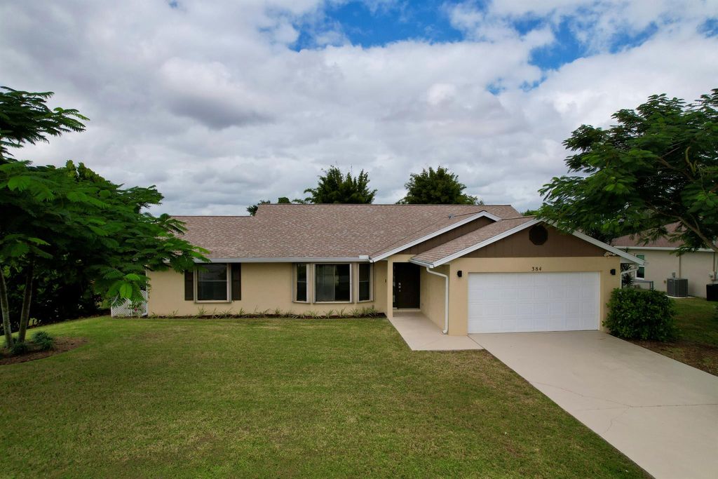 Photo of 384 SW Kestor Drive, Port St Lucie, FL 34953 (MLS # R10932563)