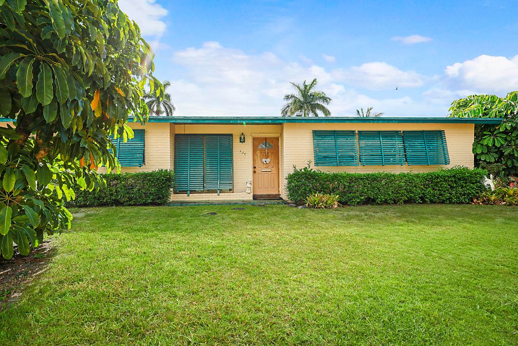 Photo of 736 Tradewind Drive, North Palm Beach, FL 33408 (MLS # R11087613)