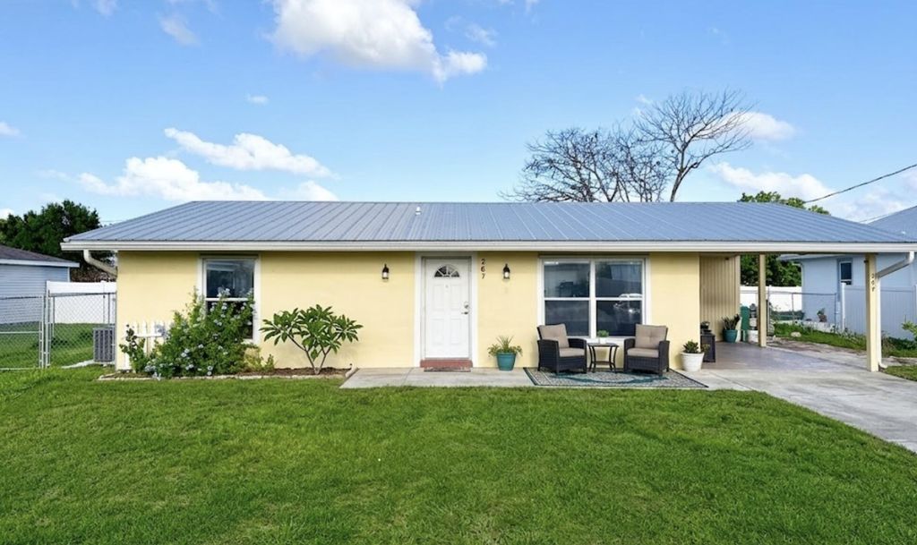 Photo of 267 NW Biltmore Street, Port Saint Lucie, FL 34983 (MLS # B26016026)