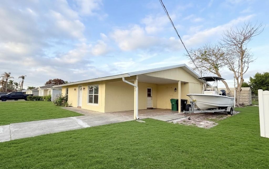 Photo of 267 NW Biltmore Street, Port Saint Lucie, FL 34983 (MLS # B26016026)