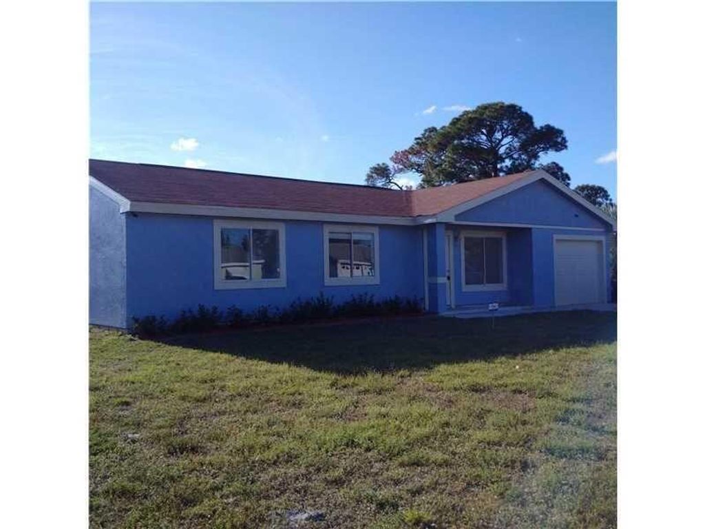 Photo of 2044 SE Triumph Road, Port St Lucie, FL 34952 (MLS # R10828506)