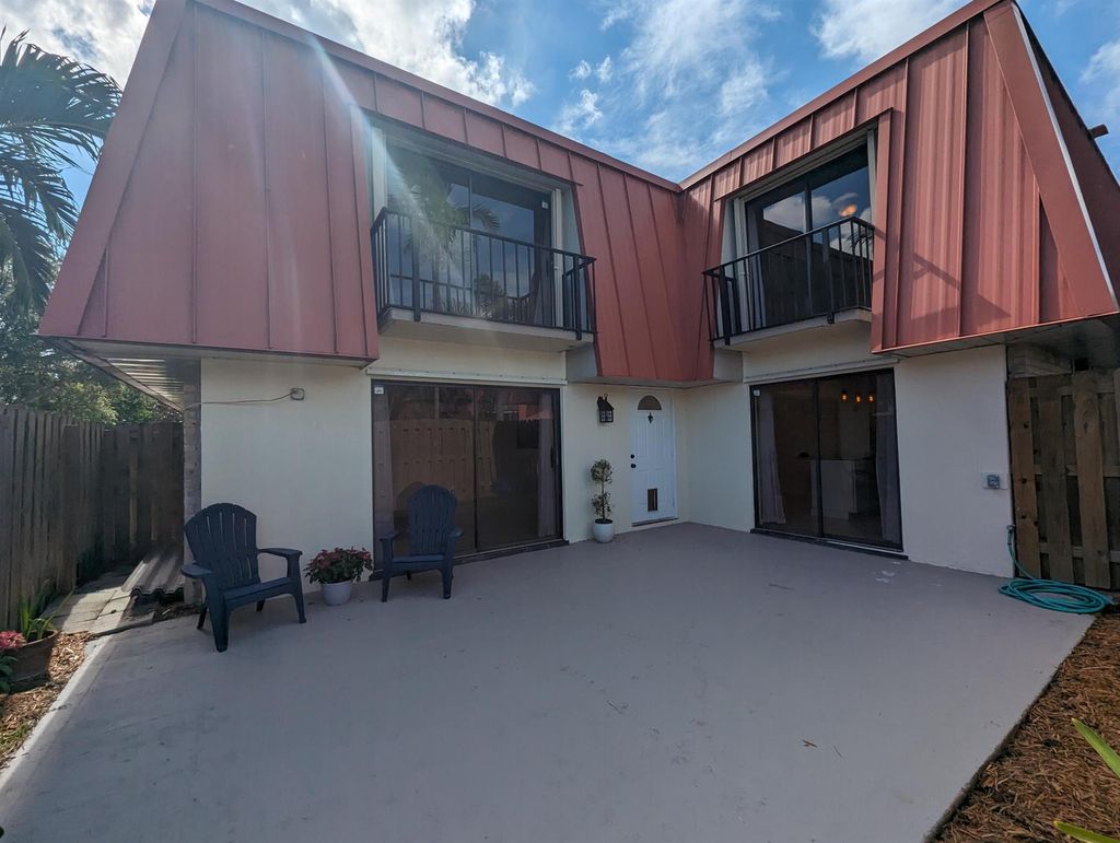 Photo of 3211 E Gardens Drive E #C, Palm Beach Gardens, FL 33410 (MLS # R10921678)