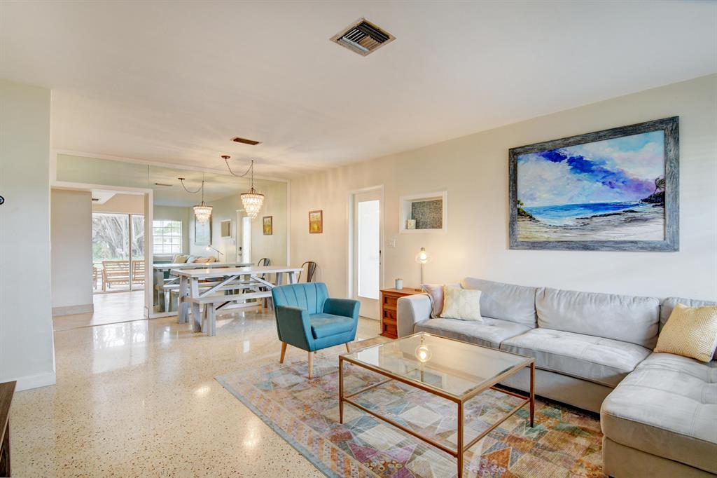 Furnished 3/2 home in East Boca less than 2 miles from the beach available on January 18th for 3 or 4 months. Well behaved pets of all sizes are welcome to roam freely in the large securely fenced back yard. No HOA! Situated on 1/3 acre, this home has beautiful terrazzo floors, tons of natural light and neutral colors. The white kitchen with granite counters leads to a large screened patio overlooking the fully fenced yard. Spacious owners bedroom with en suite bath and large walk in closet has sliders opening to the patio. Interior laundry! Photos were taken prior to the current tenants' occupancy and some of the furnishings will be different than shown. All mattresses will be new! Utilities and lawn care included in rent. Tenant responsible for 13% tourism tax.