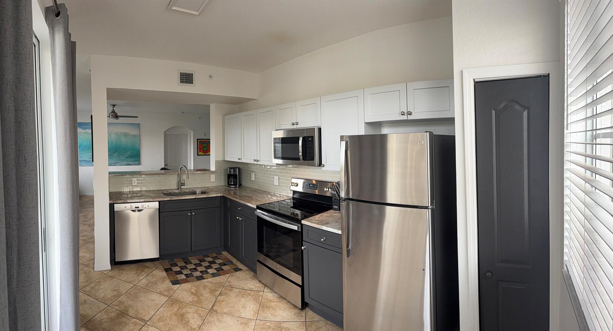 Great looking, extremely bright, 1 bedroom, 1 bath, first floor condo at Residences at Legacy Place. Offered fully furnished and ''Turn Key''. 'Wonderful kitchen with smart looking grey cabinetry, stainless steel appliances and granite tops, Patio just outside kitchen sliders. Ceramic tile throughout. Sleeper sofa in living room converts to a bed. Huge walk-in bedroom closet. Extremely large glass enclosed shower in bathroom. The garage is not accessible except possibly for some boxes. Priced as a 1 bedroom without garage, Located near the pedestrian gate to Legacy Shoppes with Total Wine, Best Buy, Michael's, and other restaurants and stores. Excellent community amenities incudes fitness center, pool, spa, tennis, and playground. All this and a great Palm Beach Gardens location too!