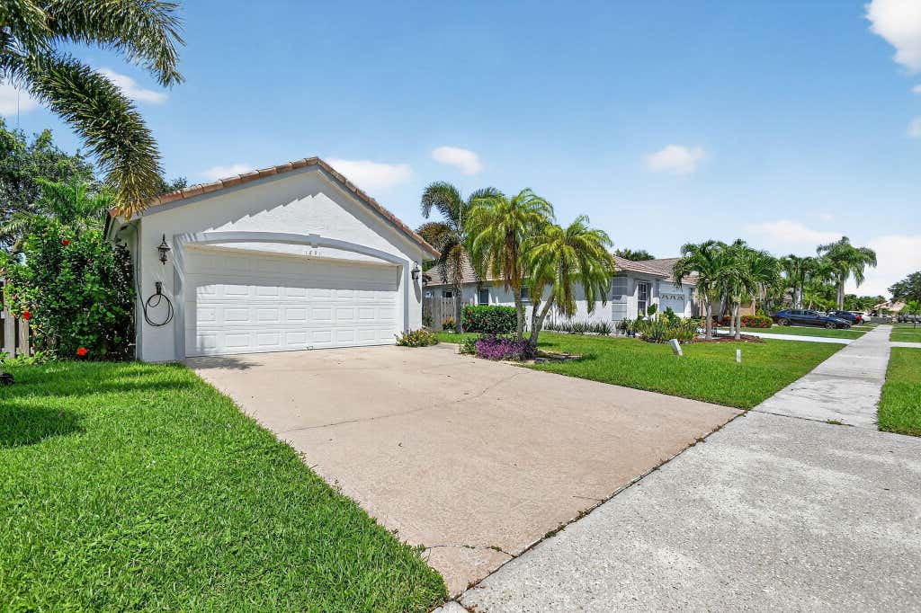 Photo of 1891 Oak Berry Circle, Wellington, FL 33414 (MLS # B26050746)