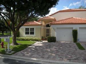 Spacious one-story corner villa with large rear patio and garden views. Very private and quiet. Open and spacious interior with vaulted ceilings, tile floors, enclosed Florida room. One car attached garage, double wide driveway. Recent upgrades include: new hurricane impact glass windows, remodeled master shower and expansive rear patio. Available for annual rent...all ages welcome.