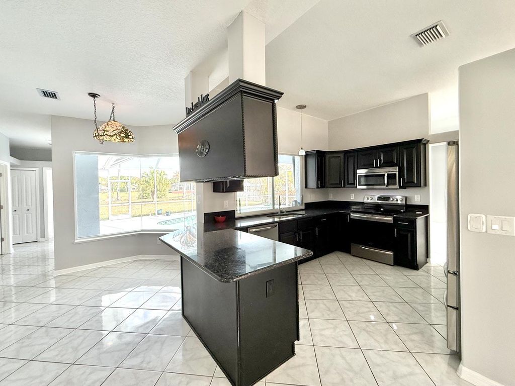 Photo of 165 SE Osprey RDG, Port Saint Lucie, FL 34984 (MLS # B26024683)