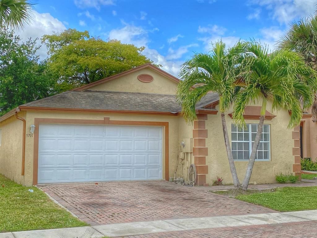 Photo of 5701 Azalea Circle, West Palm Beach, FL 33415 (MLS # R10698353)
