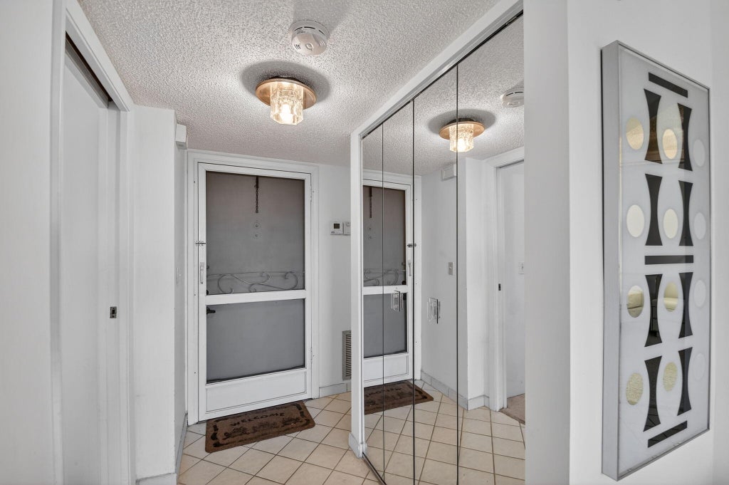 Photo of 3590 Via Poinciana #616, Lake Worth, FL 33467 (MLS # R11161675)