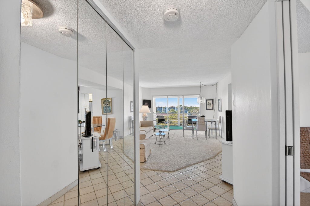 Photo of 3590 Via Poinciana #616, Lake Worth, FL 33467 (MLS # R11161675)