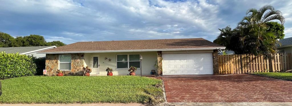 Photo of 5430 Guildcrest Street, Lake Worth, FL 33463 (MLS # R11155841)
