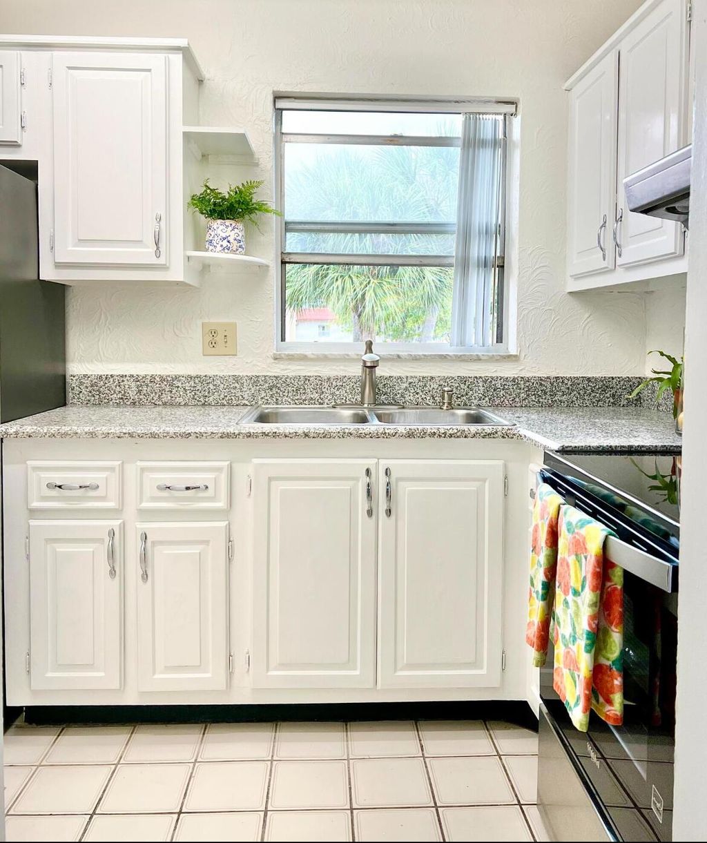 Photo of 108 Lake Carol Drive, West Palm Beach, FL 33411 (MLS # R11128639)