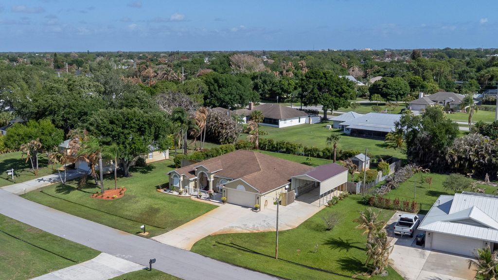 Photo of 2025 SE Allamanda Dr, Port Saint Lucie, FL 34952 (MLS # B26014187)