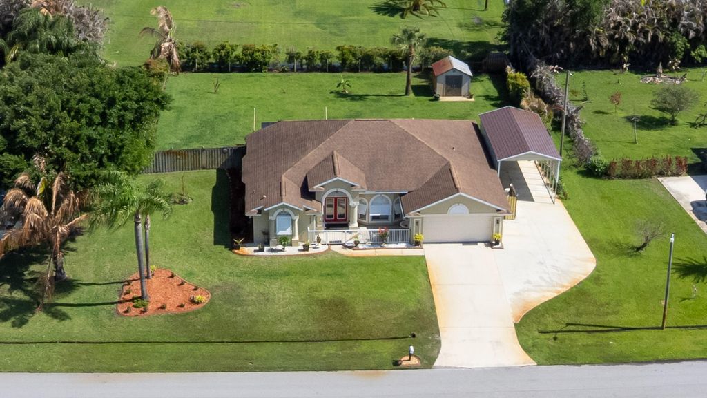 Photo of 2025 SE Allamanda Drive, Port Saint Lucie, FL 34952 (MLS # B26014187)