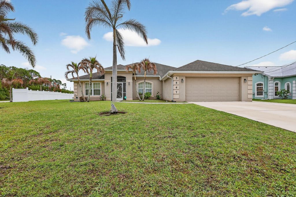 Photo of 5547 NW Cordrey Street, Port Saint Lucie, FL 34986 (MLS # B26012497)