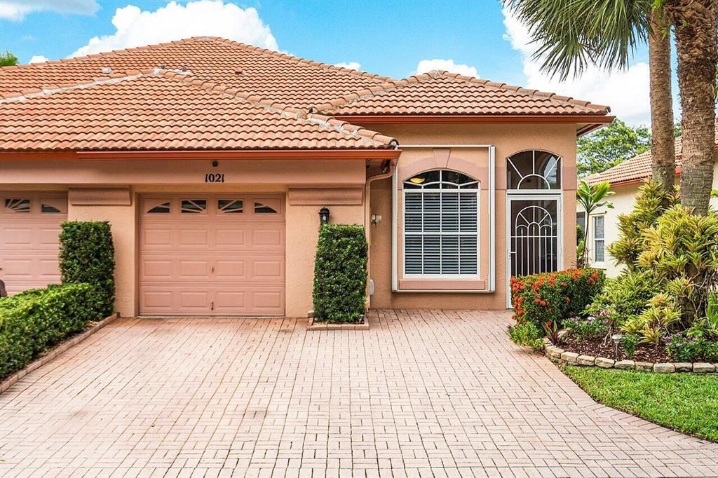 Photo of 1021 Via Jardin, Riviera Beach, FL 33418 (MLS # R10881360)