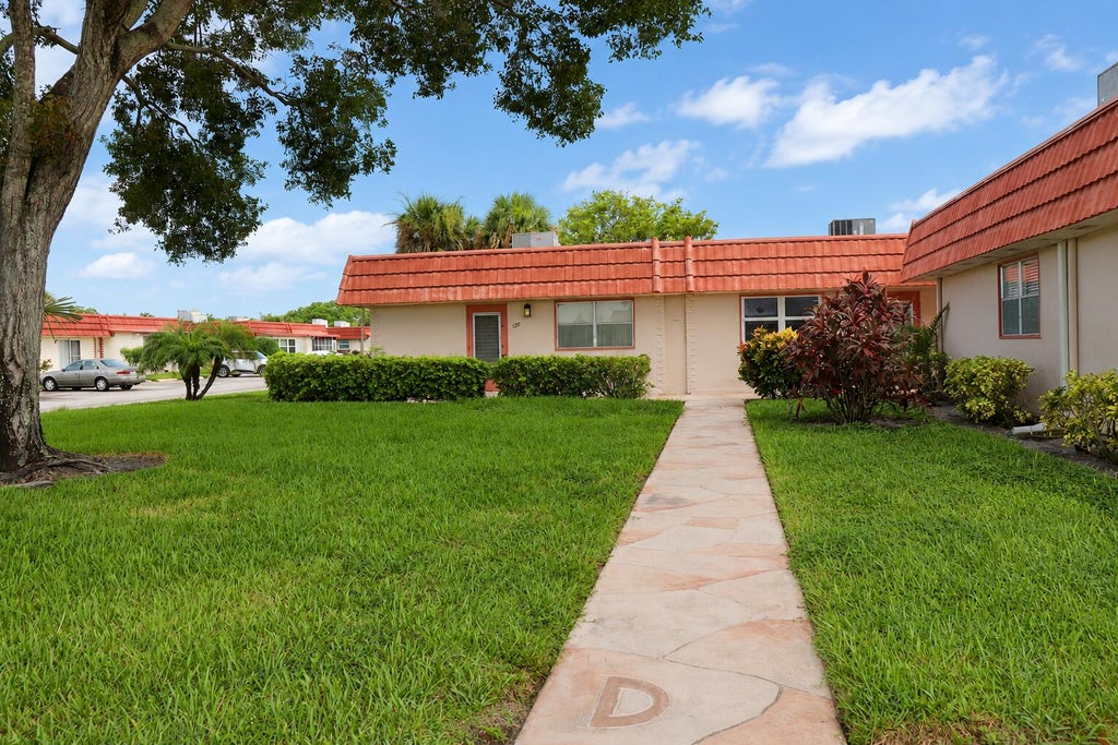 Photo of 120 Seville Blvd E, Delray Beach, FL 33446 (MLS # B26074665)