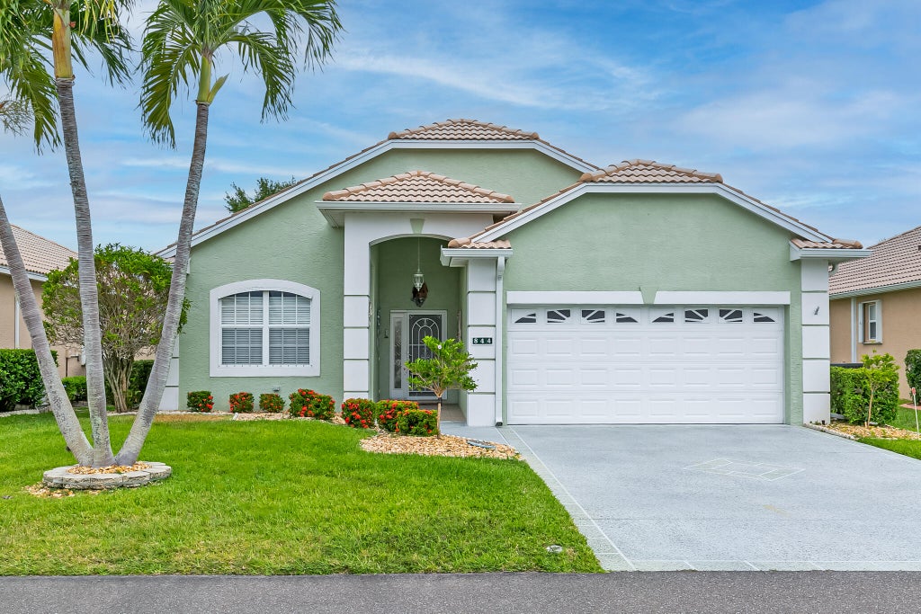 Photo of 844 NW Sorrento Lane, Port Saint Lucie, FL 34986 (MLS # R11018731)