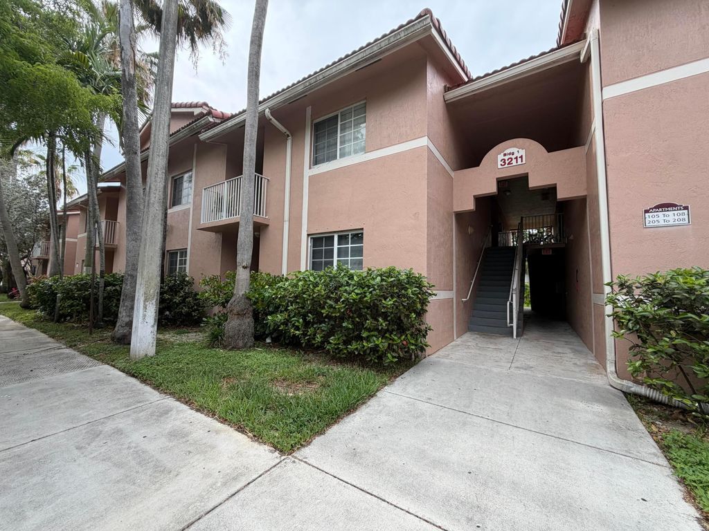 Photo of 3211 Sabal Palm Manor #105, Davie, FL 33024 (MLS # B26028089)