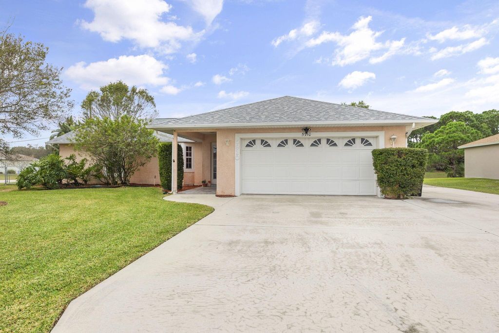 Photo of 5910 NW Bayou Court, Port Saint Lucie, FL 34986 (MLS # R10943618)