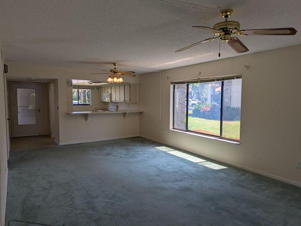 Photo of 1600 NE Dixie Highway #10-101, Jensen Beach, FL 34957 (MLS # R11111123)
