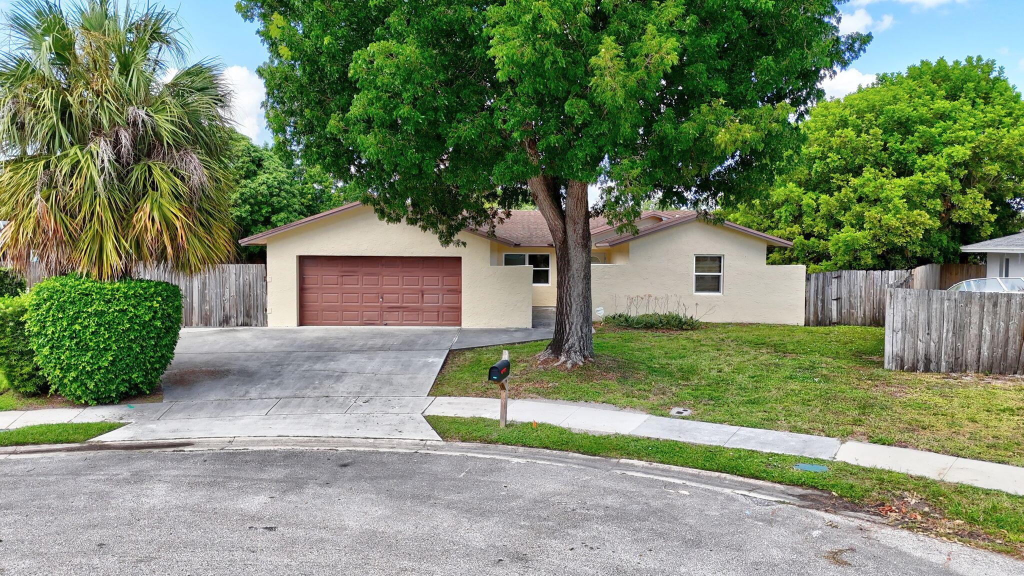 A true 4 bedroom/2 bath home with a Family room and a 2 car garage! Situated on a cut-de-sac, on an oversized pie-shaped lot. Concrete 17X10 slab on the side of the house behind the fence for your RV/Trailer, etc... Private back yard is fully fenced where you will find two separate patios, one off of the primary bedroom and one off of the family room. All but one window are impact glass. Both baths are updated.Interior laundry room.A-Rated schools, with Elementary school right across the community entrance. Roof installed 2007AC installed 2006Water Heater @2023