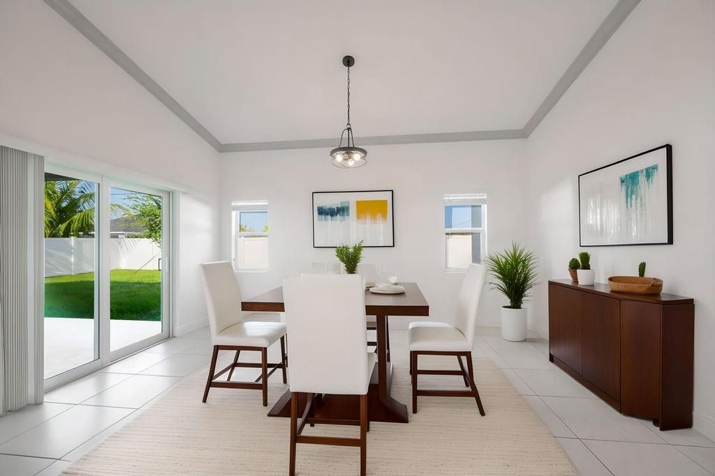 Photo of 3838 SW Hainlin Street, Port Saint Lucie, FL 34953 (MLS # F10512651)