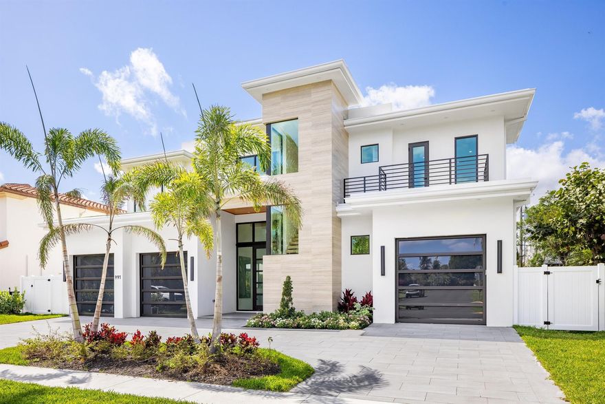Experience the Paramount of luxurious living in this brand new, meticulously designed, contemporary estate by the renowned Yacov Development Group. Tucked away in the prestigious Boca Villas community in East Boca Raton, this visionary two-story masterpiece delivers extraordinary value, seamlessly harmonizing modern sophistication with enduring charm. As you enter through the grand 10-foot glass front door, you'll be enveloped in a world of refined opulence and impeccable attention to detail. This residence boasts five generously sized bedrooms, including a downstairs VIP guest suite, each featuring its own en-suite bathroom. Additionally, an upstairs sitting area, a full cabana bath, and a stunning powder room offer both practicality and elegance. The spacious, open-concept