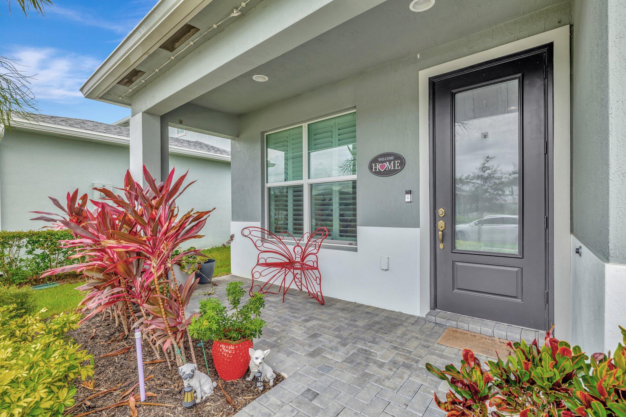 Live the Tradition lifestyle of luxury and community in your newer 4/3/2 in sought-after Manderlie. Impact windows, quartz counters, and a spacious layout are only a few of the many bonuses that this 2021 build boasts. At Manderlie, you are in the heart of Tradition, just minutes from shopping, restaurants, and I95. This community has all the bonuses of luxury living mixed with the convenience that comes with living in Tradition. Manderlie amenities include gated entrance, lawn care, pest control, event lawn & greenspace, clubhouse, fitness center, community pool, dog park, sports court, and basic cable!