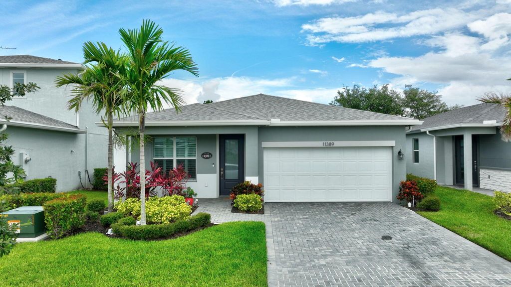 Photo of 11389 SW Lyra Drive, Port St Lucie, FL 34987 (MLS # R11128766)