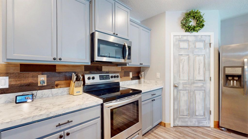 Photo of 551 SW Lairo Avenue, Port Saint Lucie, FL 34953 (MLS # R11085463)