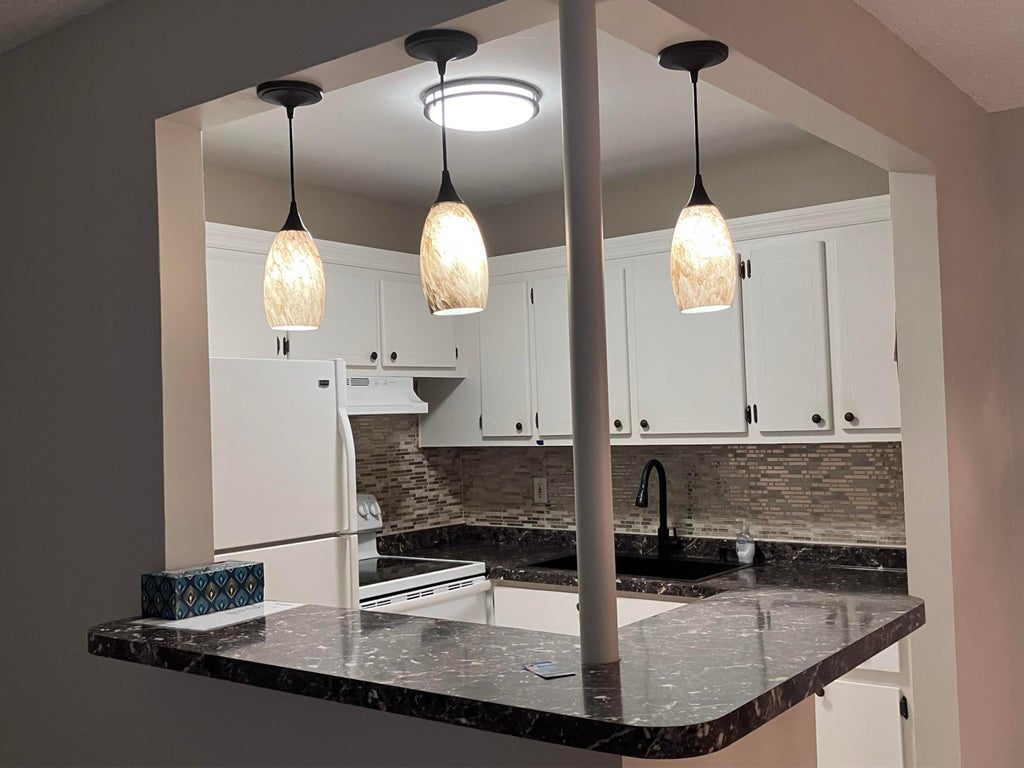 Photo of 32 Salisbury B, West Palm Beach, FL 33417 (MLS # B26025132)
