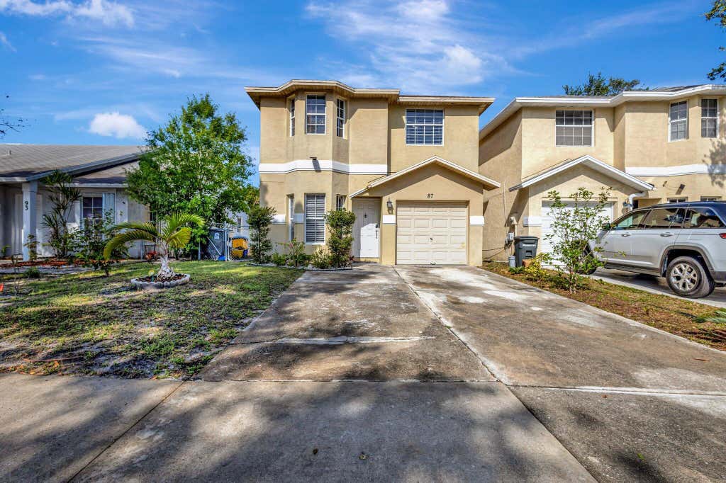 Photo of 87 Pheasant Run Boulevard, West Palm Beach, FL 33415 (MLS # B26048405)