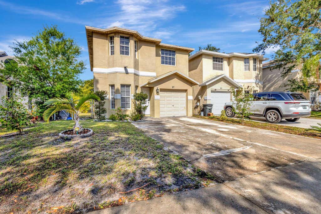 Photo of 87 Pheasant Run Boulevard, West Palm Beach, FL 33415 (MLS # B26048405)