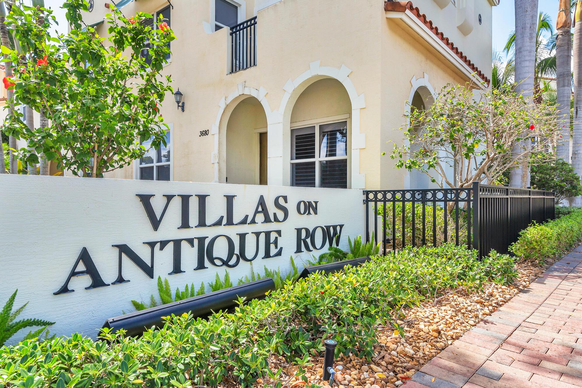 Situated in the middle of the Villas at Antique Row townhome community rest this charming 3 bedroom, 2.5 bathroom home with private laundry and quick access to the community pool and lounge. Boasting 1904 sq. ft. under air and 2,450 total sq. ft., this fabulous townhome is priced well under market value! The Villas of Antique Row are currently under (exterior) construction with this specific row of TH's just beginning its work/ renovation. Featuring a 2-car garage and ample street parking, neither you nor your guests will have a difficult time finding a parking space. Close to area beaches, fine dining, Worth Avenue shopping, I-95, PBI Airport, Flagler Drive bike trail and so much more! Please call us for more details about the construction and to schedule a private showing!