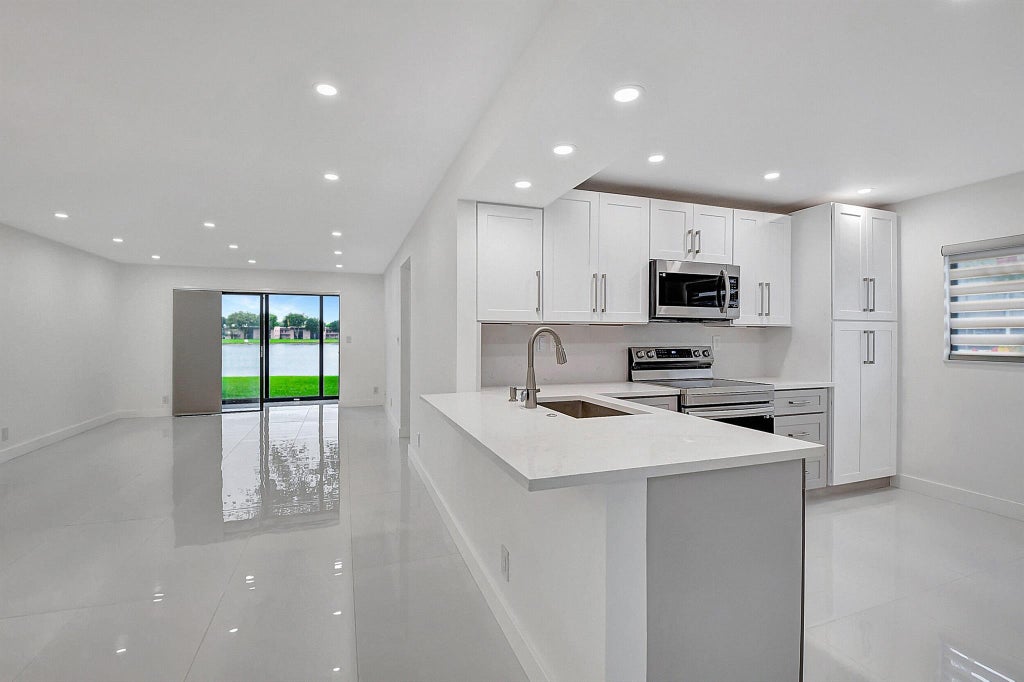 Photo of 15378 Lakes Of Delray Boulevard #3, Delray Beach, FL 33484 (MLS # R11130982)