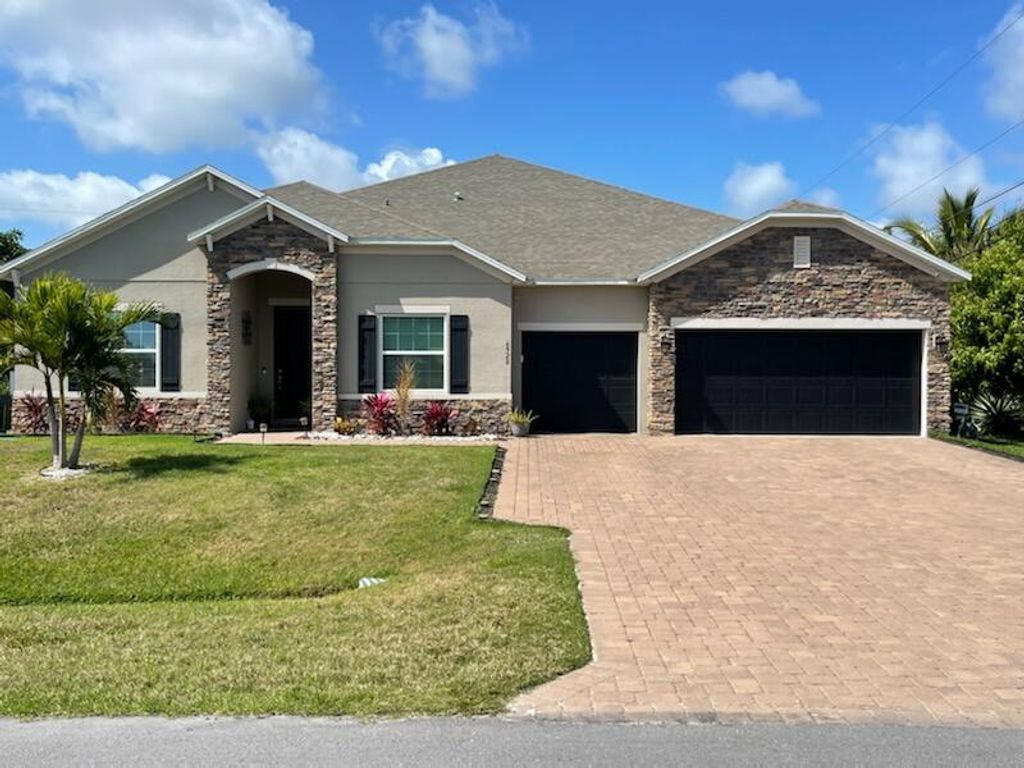 Photo of 6920 NW Jorgensen Road, Port Saint Lucie, FL 34983 (MLS # R10779727)