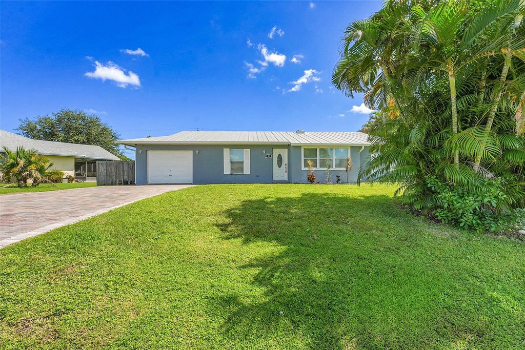 Photo of 709 SW Dorchester Street, Port Saint Lucie, FL 34983 (MLS # F10540067)