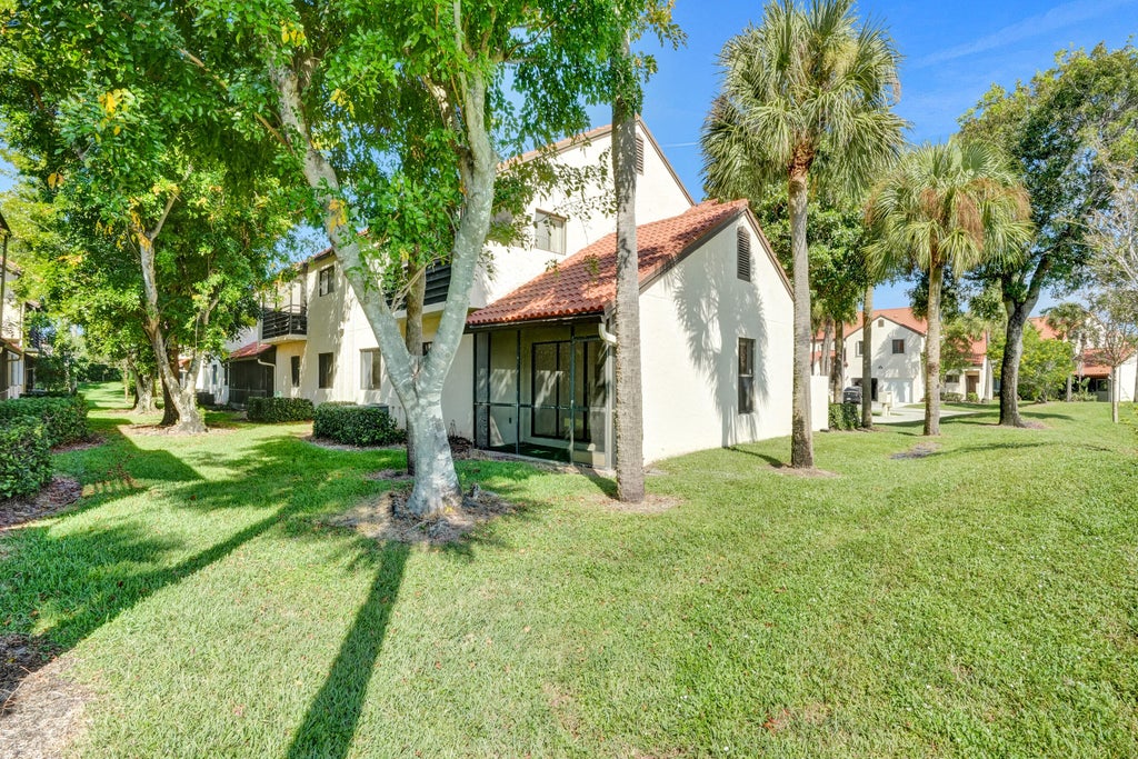 Photo of 12 VIA DE CASAS SUR #101, Boynton Beach, FL 33426 (MLS # B26066035)